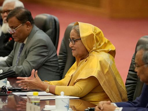 Bangladesh PM Hasina says opposition to blame for deadly unrest, maintains curfew