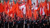 Workers, activists around the world hold May Day rallies urging greater rights, more pay