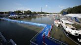 Olympic officials postpone men's triathlon due to pollution in the Seine