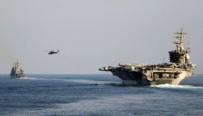 Photos Purport To Show Damage To U.S. Aircraft Carrier After Houthi Missile Strike