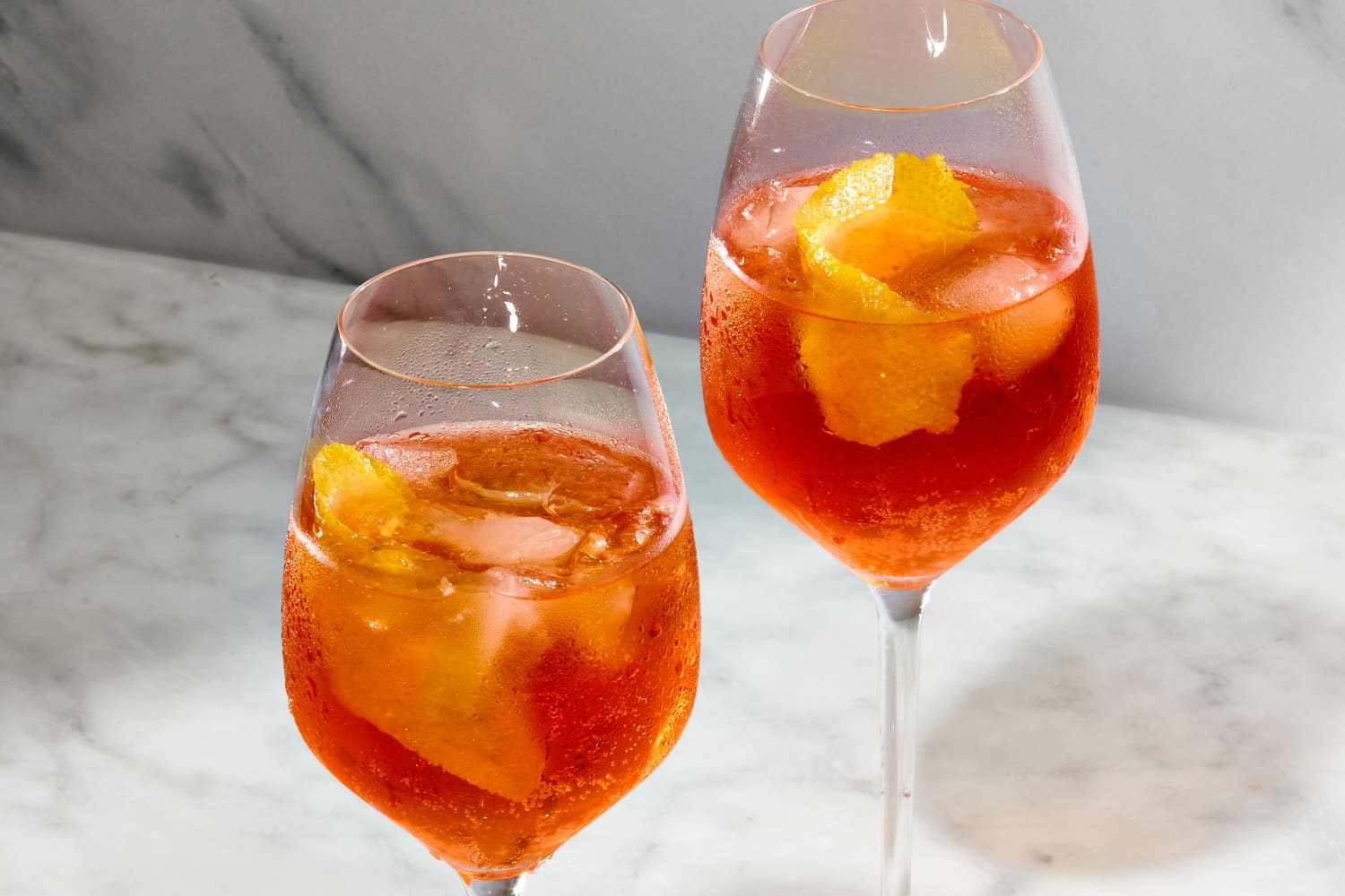 10 Delicious Spritz Cocktail Recipes That Go Way Beyond Aperol (They're So Refreshing!)