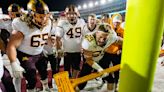 Minnesota rallies late to beat Wisconsin 23-16, keep Axe