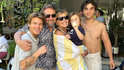 Sharon Stone snaps family photo at 4th of July pool party