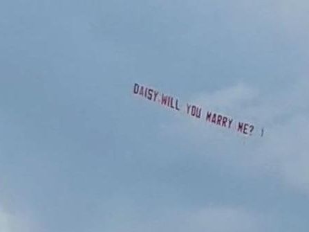 Love is in the air during aerial proposal