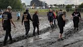 Germany's Wacken metal festival halts admissions after persistent rain turns site to mud