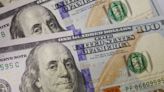 Dollar gives back gains, strong wage growth complicates Fed policy