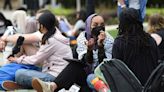 University of Tennessee demonstrators remain on campus as darkness falls Friday night