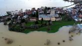 Flooded Tewkesbury ‘cut off’ after Storm Henk as homes evacuated across UK