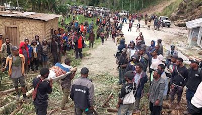 Rescuers search rubble after over 300 buried in Papua New Guinea landslide