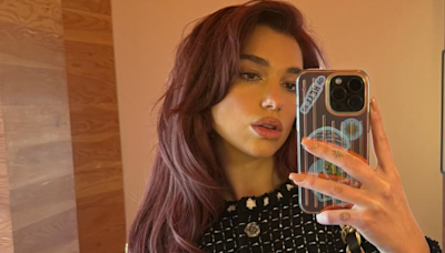 Dua Lipa is so glam grunge in a backless bandana top and cut-out leather trousers