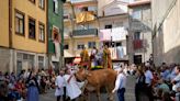 Ox-pulled floats with sacred images of Mary draw thousands to Portugal’s wine-country procession