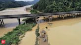 Southern China faces heavy floods, and landslides kill at least 9