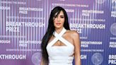 Kim Kardashian Stuns in All-White Look on Breakthrough Prize Red Carpet