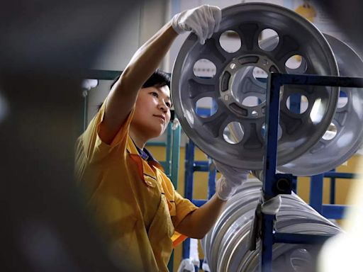 Asian factory activity expands in May on robust global demand
