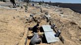 As Gaza death toll passes 40,000, corpses are buried in yards, streets, tiered graves