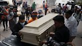 Fear stalks the funerals of victims of Honduras prison massacre