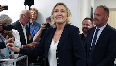 Far right leads first round of France’s parliamentary election in blow to Macron