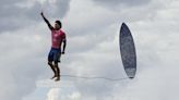 Brazilian surfer Gabriel Medina appears to walk on water, and other photos from Monday and Tuesday at the 2024 Paris Olympics