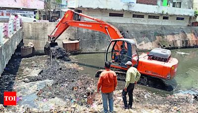 BMC races to clean drains before rain arrives | Bhopal News - Times of India