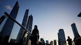 Asia shares touch two-year top as China plans property boost
