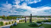 Two CT men are preparing to play mini golf on a large stage in the Czech Republic