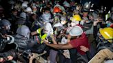 Police dismantle pro-Palestinian encampment at UCLA campus protest, 100-plus demonstrators detained