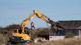 Homes demolished on Norfolk cliff edge over fears they could fall into sea