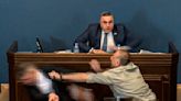 Watch: Lawmakers punched, wrestled as Georgia parliament falls into chaos