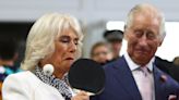 Queen takes on French president’s wife in game of table tennis