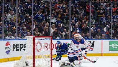 Canucks overcome 3-goal deficit to stun Oilers 5-4 in Game 1