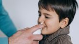 Giving children salt water nasal drops can cut duration of a cold and stop it spreading, study suggests