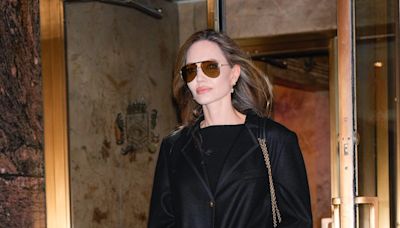 Angelina Jolie & Madonna Prove All An Icon Needs Is A Great Black Coat