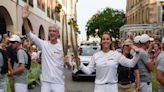 Islander transfers Olympic flame to football legend in Strasbourg