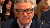 Alec Baldwin scowls as he's blasted for 'playing pretend with real gun' at trial