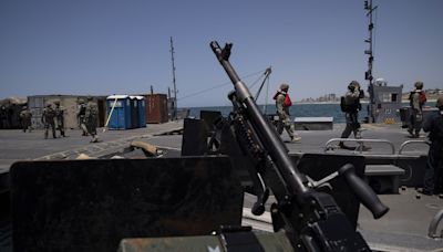 UN starts to move tonnes of aid from U.S.-built Gaza pier after security fears suspended work