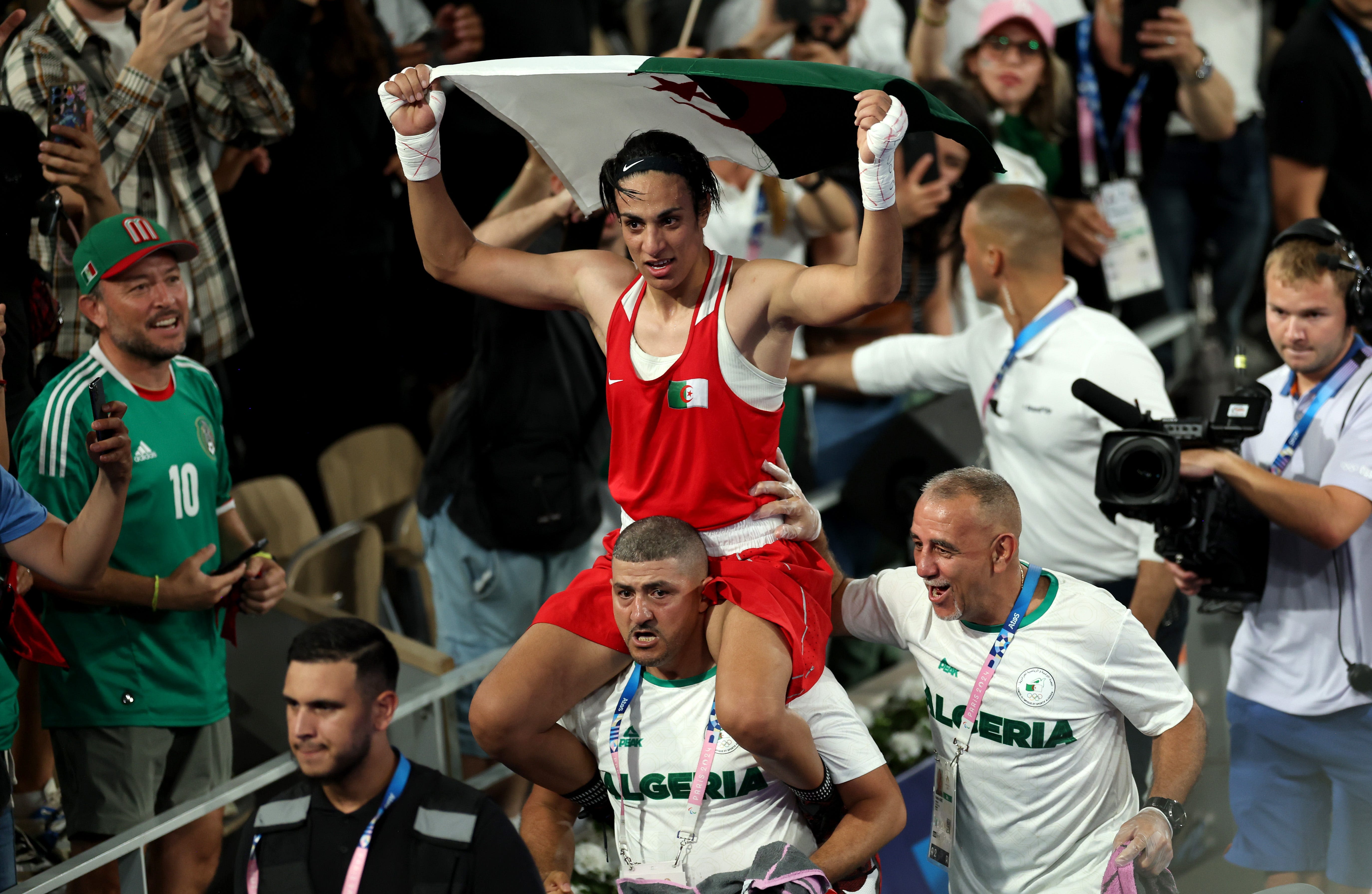 7 photos of Algerian boxer Imane Khelif triumphantly celebrating her gold medal victory at the Olympics