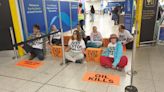 Just Stop Oil activists arrested at Gatwick Airport after departure gate protest