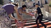 Activists pour paint down Rome’s Spanish Steps in outrage over femicide in Italy