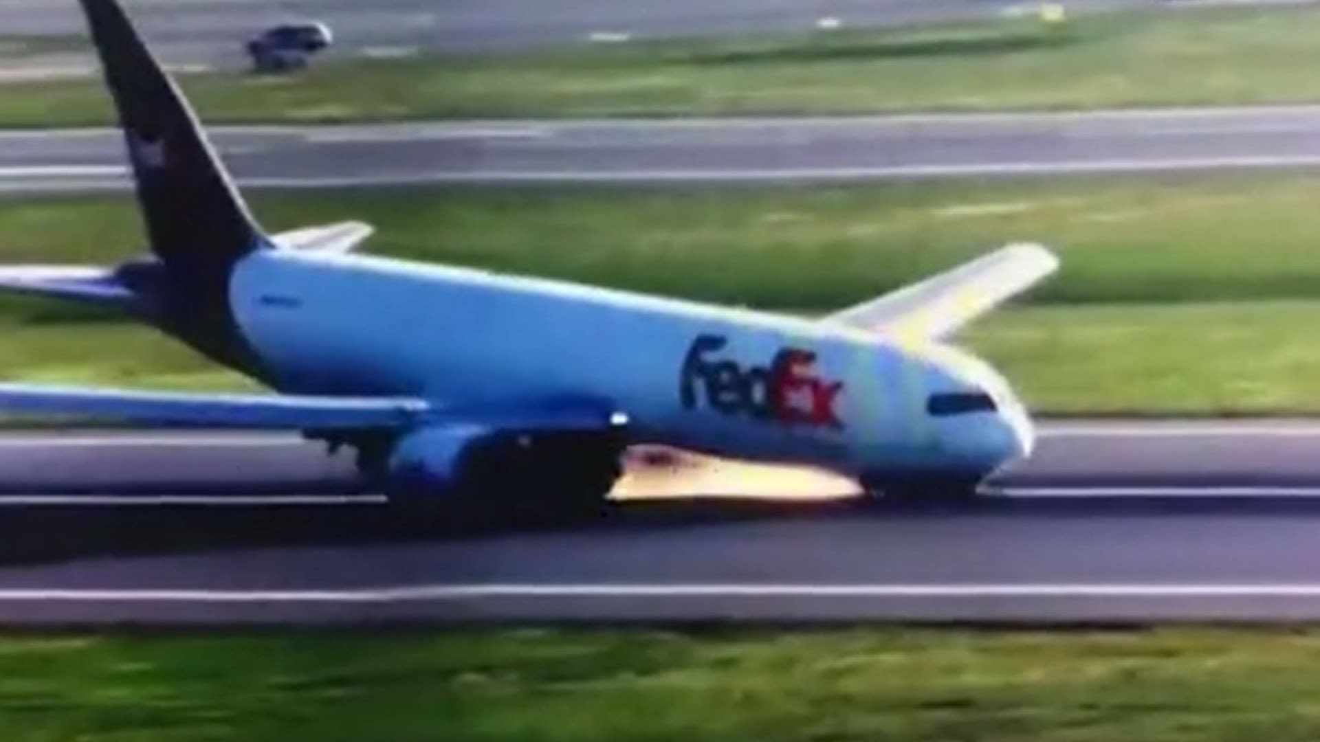 Terrifying moment Boeing plane nosedives on runway and sends sparks flying