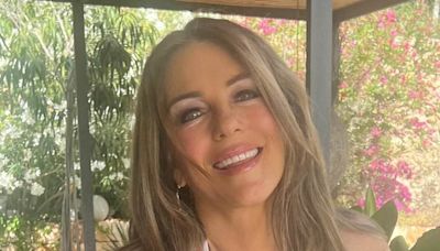 Elizabeth Hurley shows off her jaw-dropping figure in white bikini