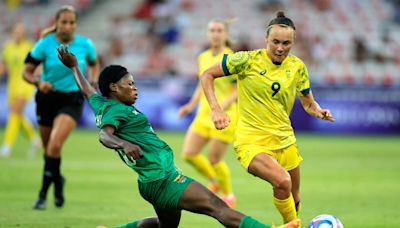 Australia keeps Olympic medal hopes alive with 6-5 win over Zambia