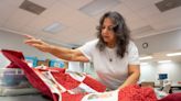 Sewing brigade makes photo quilts for military kids who miss their parents I Grumet