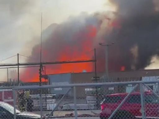 Massive fire breaks out at pallet business on Chicago's West Side