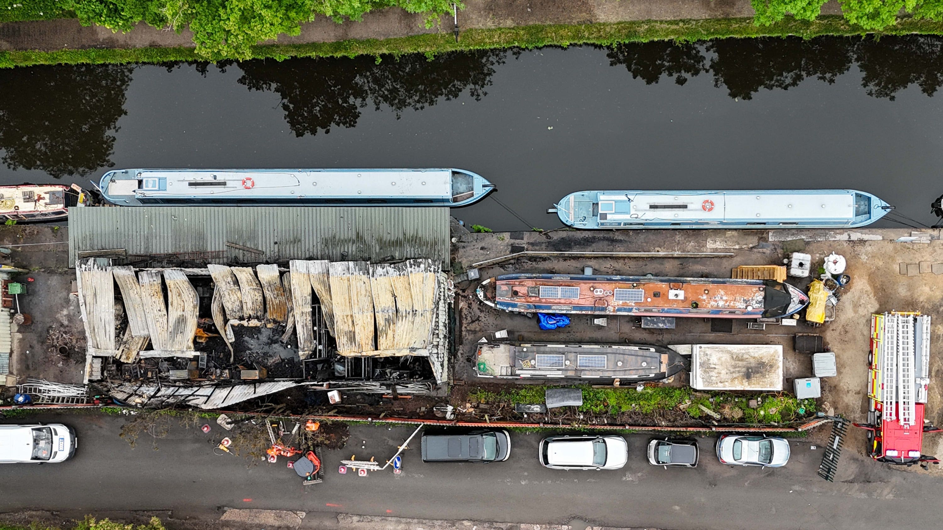 Firefighters from across city tackle boatyard blaze