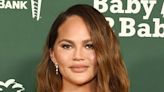 Chrissy Teigen Handles Major Wardrobe Malfunction Like a Total Pro