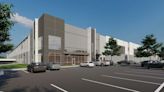 Warehouses under construction in Auburndale next to Amazon distribution center