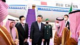 Xi Jinping’s grand welcome in Saudi Arabia compared to Joe Biden’s ‘cold fist bump’