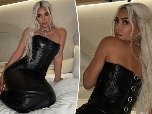 Kim Kardashian poses on private jet in multi-buckled leather corset: ‘Casual’