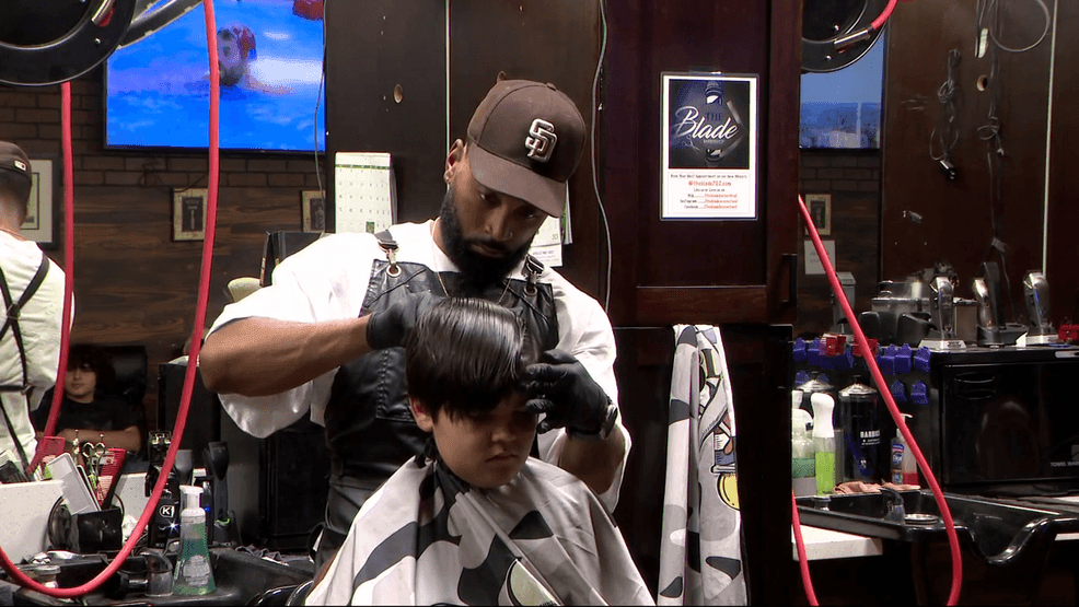 Local barbershop helps kids get ready for the first day of school, free haircuts, shoes