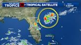 Tropical disturbance spins showers into Central Florida